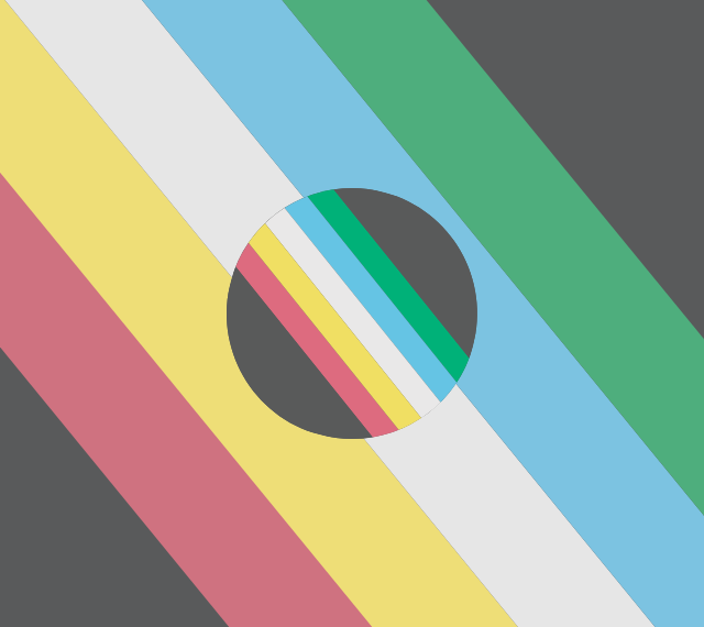 The Disability Pride flag, a black background with diagonal red, yellow, white, blue, and green stripes next to each other in the middle. A smaller version of the flag has been cut into a circle and placed in the centre of the photo to emphasize the colours of the flag. 