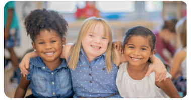 Three girls sitting next to each other with their arms around each other. 