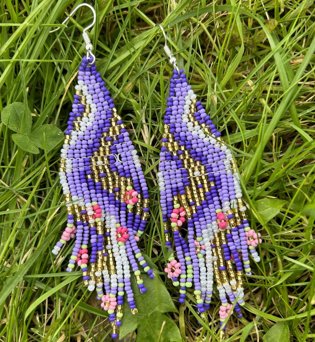 A pair of beaded earrings that Maegan made.