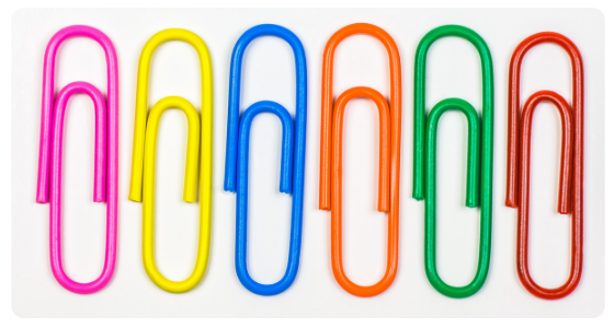 Paperclips that are all a different colour, which symbolizes the different and intersecting identities of people in the workplace